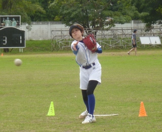 投げる